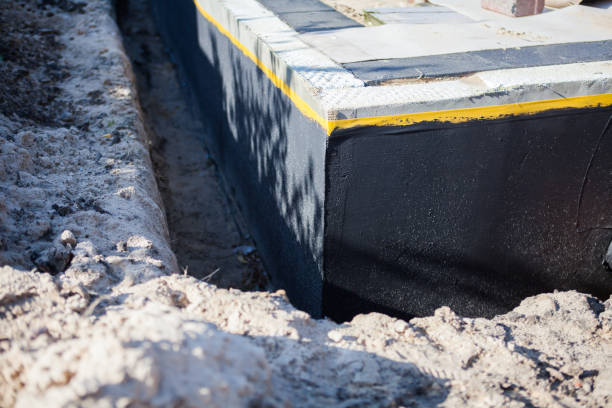 Professional Waterproofing technician working in Ohatchee, AL